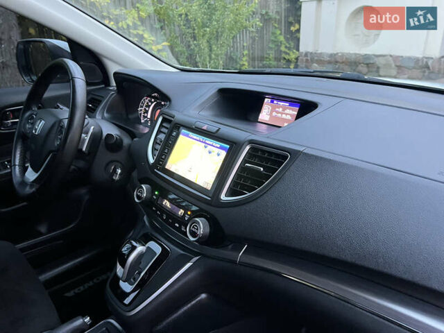 Белый Хонда СРВ, объемом двигателя 1.6 л и пробегом 151 тыс. км за 19850 $, фото 95 на Automoto.ua