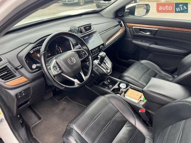 Белый Хонда СРВ, объемом двигателя 1.5 л и пробегом 178 тыс. км за 21200 $, фото 2 на Automoto.ua