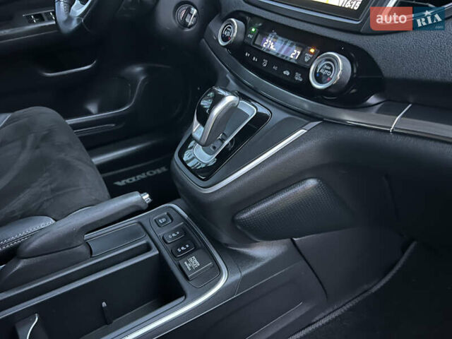 Белый Хонда СРВ, объемом двигателя 1.6 л и пробегом 151 тыс. км за 19850 $, фото 94 на Automoto.ua