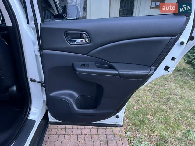 Белый Хонда СРВ, объемом двигателя 1.6 л и пробегом 151 тыс. км за 19850 $, фото 77 на Automoto.ua