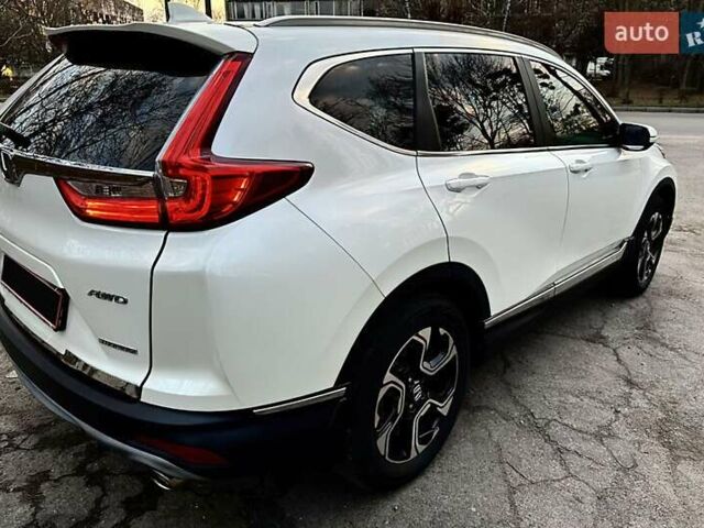 Белый Хонда СРВ, объемом двигателя 1.5 л и пробегом 101 тыс. км за 18300 $, фото 4 на Automoto.ua