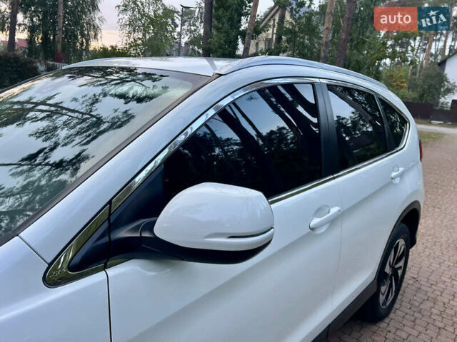 Белый Хонда СРВ, объемом двигателя 1.6 л и пробегом 151 тыс. км за 19850 $, фото 105 на Automoto.ua