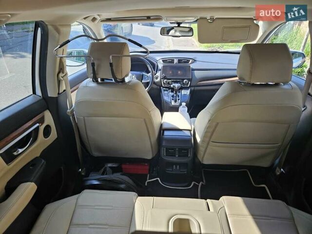 Белый Хонда СРВ, объемом двигателя 1.5 л и пробегом 192 тыс. км за 21000 $, фото 2 на Automoto.ua