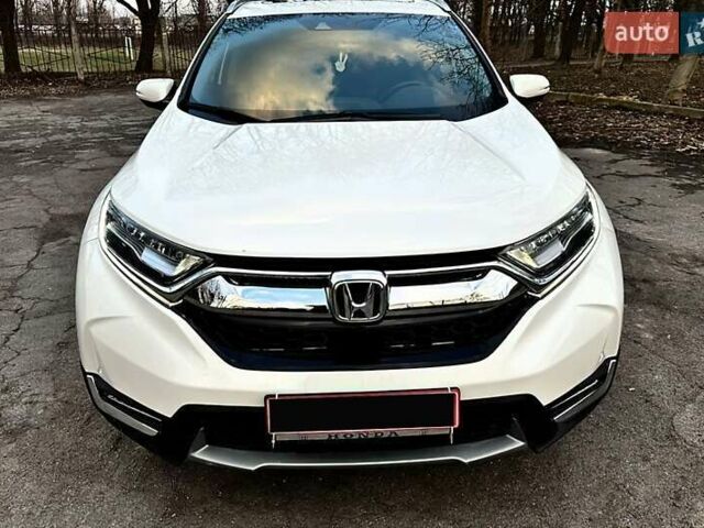 Белый Хонда СРВ, объемом двигателя 1.5 л и пробегом 101 тыс. км за 18300 $, фото 1 на Automoto.ua