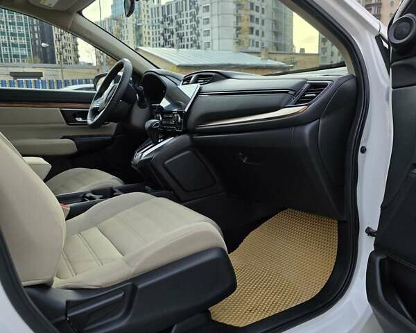 Белый Хонда СРВ, объемом двигателя 1.5 л и пробегом 115 тыс. км за 19500 $, фото 23 на Automoto.ua