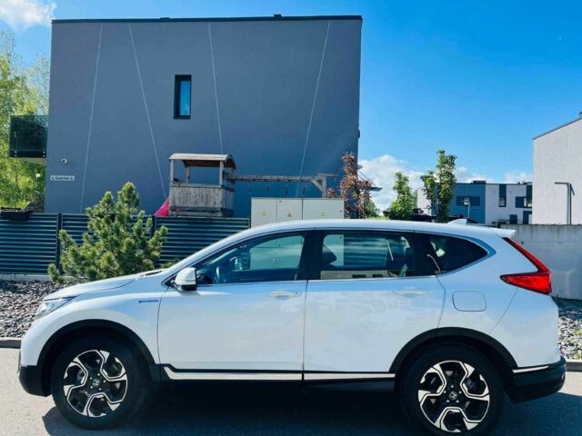 Белый Хонда СРВ, объемом двигателя 2 л и пробегом 195 тыс. км за 17000 $, фото 1 на Automoto.ua