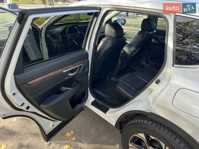 Белый Хонда СРВ, объемом двигателя 1.5 л и пробегом 148 тыс. км за 19850 $, фото 10 на Automoto.ua