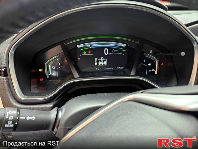 Білий Хонда СРВ, об'ємом двигуна 2 л та пробігом 40 тис. км за 40000 $, фото 6 на Automoto.ua