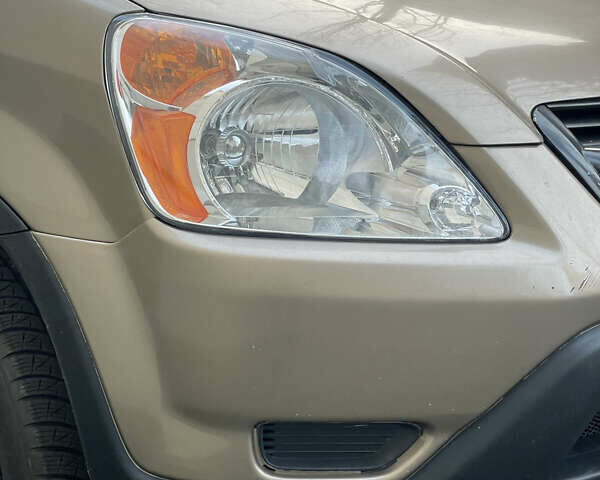 Бежевий Хонда СРВ, об'ємом двигуна 2 л та пробігом 209 тис. км за 6000 $, фото 2 на Automoto.ua