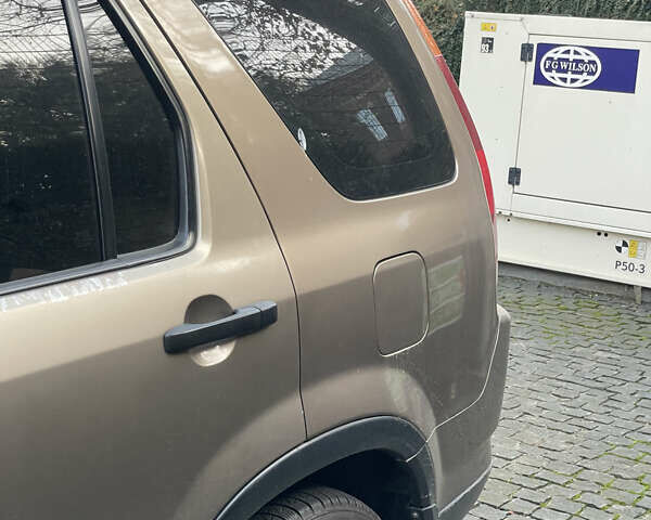 Бежевий Хонда СРВ, об'ємом двигуна 2 л та пробігом 209 тис. км за 6000 $, фото 16 на Automoto.ua