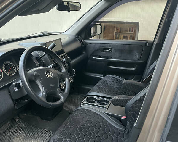 Бежевий Хонда СРВ, об'ємом двигуна 2 л та пробігом 209 тис. км за 6000 $, фото 31 на Automoto.ua