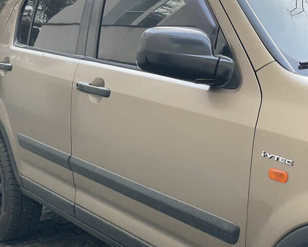 Бежевий Хонда СРВ, об'ємом двигуна 2 л та пробігом 209 тис. км за 6000 $, фото 5 на Automoto.ua