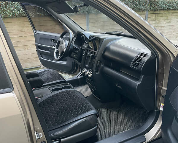 Бежевий Хонда СРВ, об'ємом двигуна 2 л та пробігом 209 тис. км за 6000 $, фото 37 на Automoto.ua