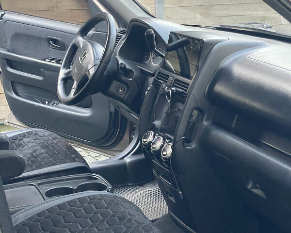 Бежевий Хонда СРВ, об'ємом двигуна 2 л та пробігом 209 тис. км за 6000 $, фото 38 на Automoto.ua