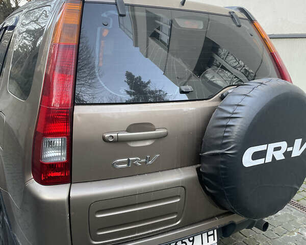 Бежевий Хонда СРВ, об'ємом двигуна 2 л та пробігом 209 тис. км за 6000 $, фото 12 на Automoto.ua