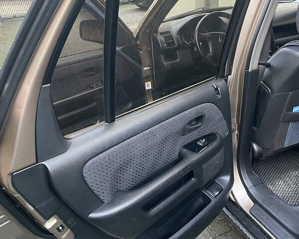 Бежевий Хонда СРВ, об'ємом двигуна 2 л та пробігом 209 тис. км за 6000 $, фото 23 на Automoto.ua