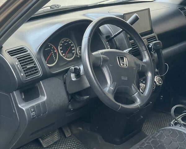 Бежевий Хонда СРВ, об'ємом двигуна 2 л та пробігом 209 тис. км за 6000 $, фото 30 на Automoto.ua