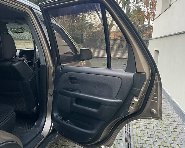 Бежевий Хонда СРВ, об'ємом двигуна 2 л та пробігом 209 тис. км за 6000 $, фото 33 на Automoto.ua