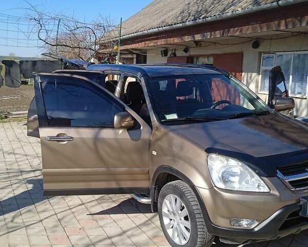 Бежевий Хонда СРВ, об'ємом двигуна 2 л та пробігом 260 тис. км за 7800 $, фото 1 на Automoto.ua