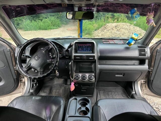 Бежевый Хонда СРВ, объемом двигателя 2 л и пробегом 314 тыс. км за 7500 $, фото 5 на Automoto.ua