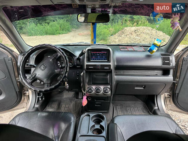 Бежевый Хонда СРВ, объемом двигателя 2 л и пробегом 313 тыс. км за 7500 $, фото 6 на Automoto.ua