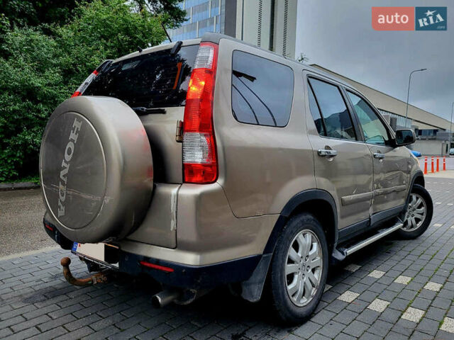 Бежевий Хонда СРВ, об'ємом двигуна 2 л та пробігом 360 тис. км за 4100 $, фото 7 на Automoto.ua