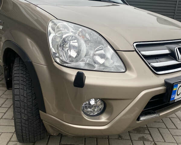 Бежевый Хонда СРВ, объемом двигателя 2 л и пробегом 320 тыс. км за 8000 $, фото 3 на Automoto.ua