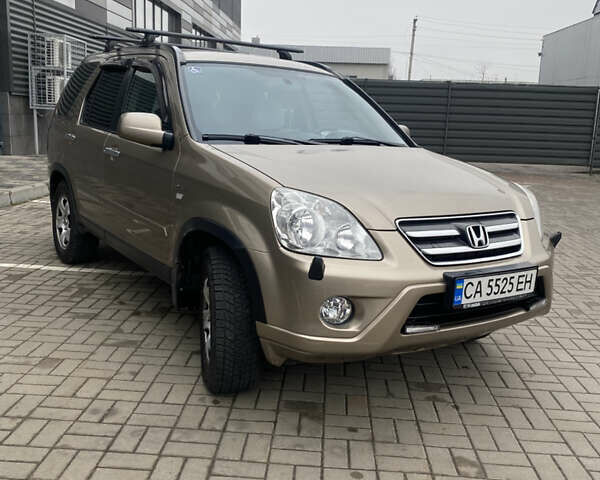 Бежевый Хонда СРВ, объемом двигателя 2 л и пробегом 320 тыс. км за 8000 $, фото 1 на Automoto.ua