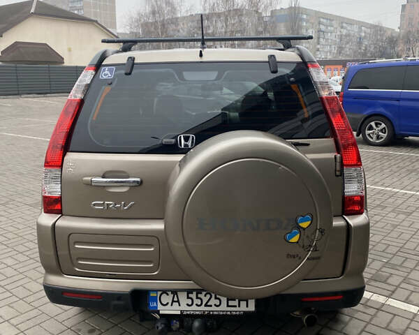 Бежевый Хонда СРВ, объемом двигателя 2 л и пробегом 320 тыс. км за 8000 $, фото 8 на Automoto.ua