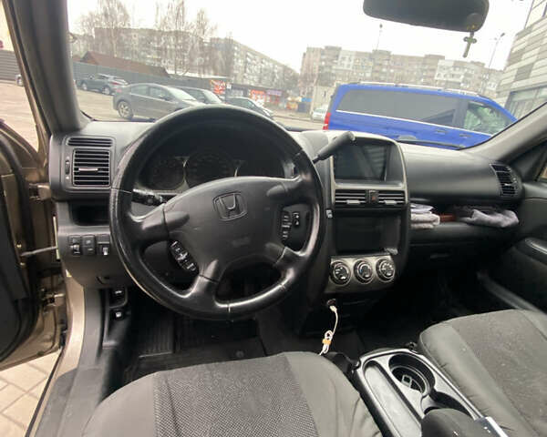 Бежевый Хонда СРВ, объемом двигателя 2 л и пробегом 320 тыс. км за 8000 $, фото 24 на Automoto.ua