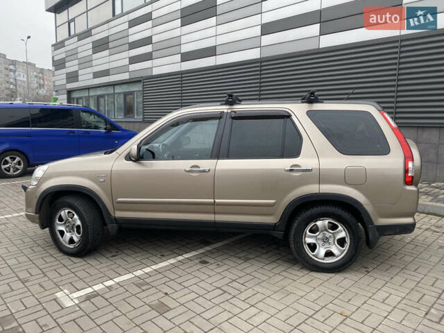 Бежевый Хонда СРВ, объемом двигателя 2 л и пробегом 320 тыс. км за 8000 $, фото 11 на Automoto.ua