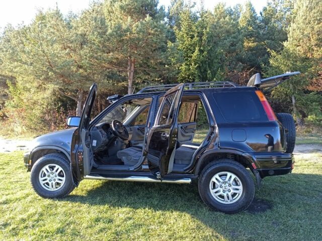 Черный Хонда СРВ, объемом двигателя 2 л и пробегом 278 тыс. км за 6000 $, фото 11 на Automoto.ua