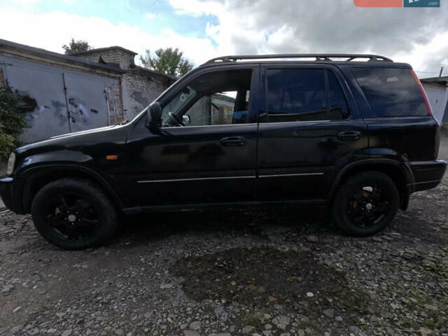 Черный Хонда СРВ, объемом двигателя 2 л и пробегом 314 тыс. км за 5500 $, фото 4 на Automoto.ua