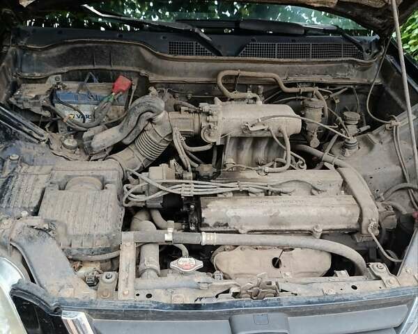 Чорний Хонда СРВ, об'ємом двигуна 2 л та пробігом 340 тис. км за 3500 $, фото 11 на Automoto.ua