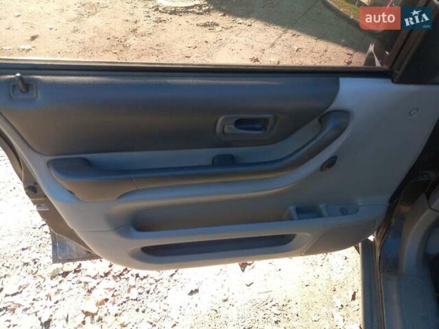 Чорний Хонда СРВ, об'ємом двигуна 2 л та пробігом 445 тис. км за 3350 $, фото 16 на Automoto.ua