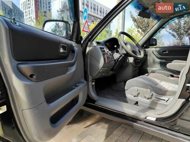Черный Хонда СРВ, объемом двигателя 2 л и пробегом 277 тыс. км за 3990 $, фото 28 на Automoto.ua