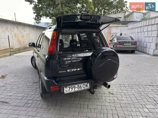 Чорний Хонда СРВ, об'ємом двигуна 2 л та пробігом 345 тис. км за 7000 $, фото 4 на Automoto.ua