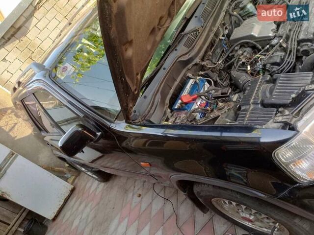 Черный Хонда СРВ, объемом двигателя 2 л и пробегом 299 тыс. км за 4999 $, фото 2 на Automoto.ua