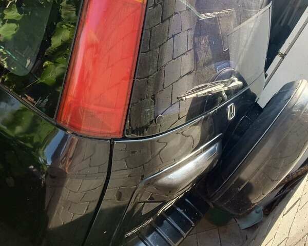 Черный Хонда СРВ, объемом двигателя 2 л и пробегом 299 тыс. км за 4999 $, фото 4 на Automoto.ua