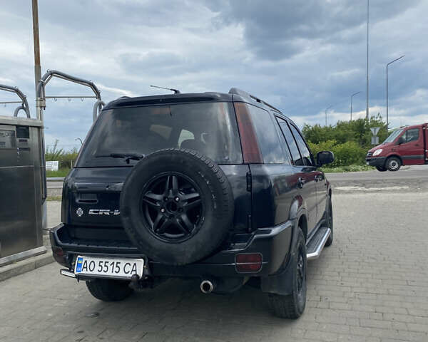 Чорний Хонда СРВ, об'ємом двигуна 2 л та пробігом 247 тис. км за 4750 $, фото 9 на Automoto.ua