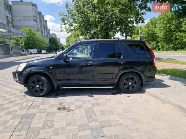 Чорний Хонда СРВ, об'ємом двигуна 2 л та пробігом 268 тис. км за 6500 $, фото 2 на Automoto.ua