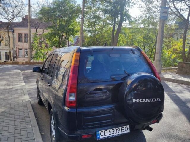 Черный Хонда СРВ, объемом двигателя 2 л и пробегом 468 тыс. км за 6000 $, фото 1 на Automoto.ua