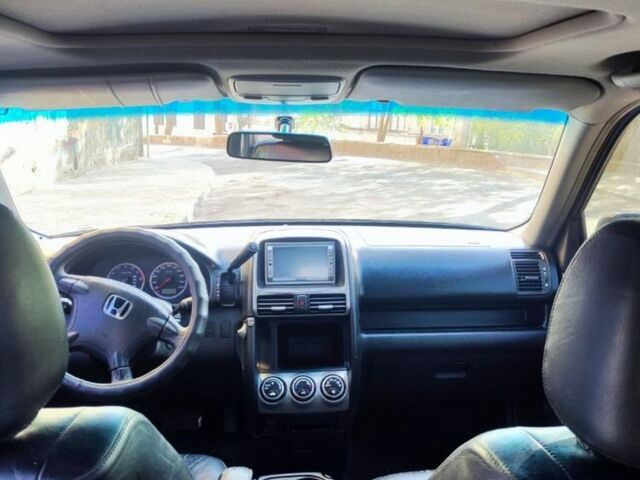 Черный Хонда СРВ, объемом двигателя 2 л и пробегом 468 тыс. км за 6000 $, фото 3 на Automoto.ua