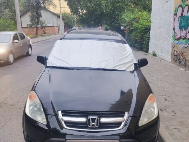 Черный Хонда СРВ, объемом двигателя 2 л и пробегом 468 тыс. км за 6000 $, фото 2 на Automoto.ua