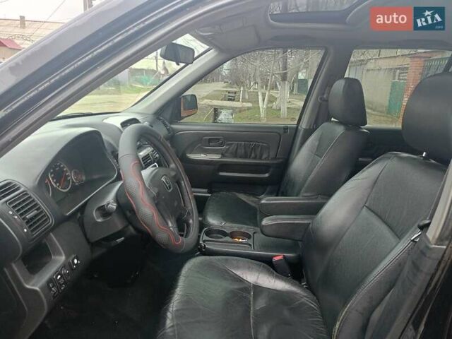 Черный Хонда СРВ, объемом двигателя 2 л и пробегом 335 тыс. км за 6700 $, фото 1 на Automoto.ua