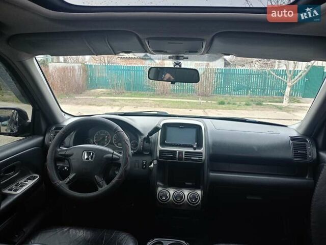 Черный Хонда СРВ, объемом двигателя 2 л и пробегом 335 тыс. км за 6700 $, фото 3 на Automoto.ua