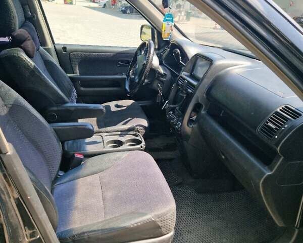 Чорний Хонда СРВ, об'ємом двигуна 2 л та пробігом 268 тис. км за 6500 $, фото 7 на Automoto.ua