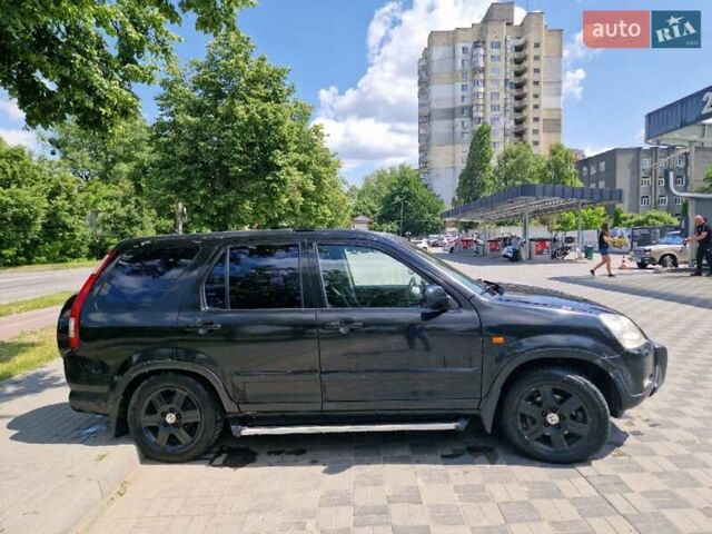 Чорний Хонда СРВ, об'ємом двигуна 2 л та пробігом 268 тис. км за 6500 $, фото 4 на Automoto.ua
