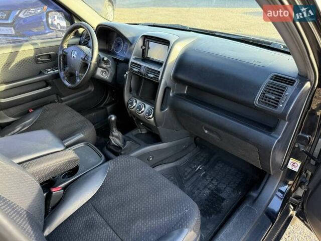 Чорний Хонда СРВ, об'ємом двигуна 2 л та пробігом 320 тис. км за 5800 $, фото 17 на Automoto.ua