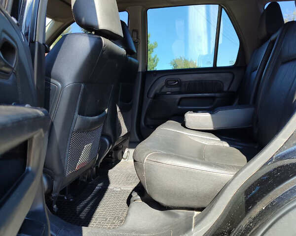 Черный Хонда СРВ, объемом двигателя 2 л и пробегом 268 тыс. км за 5300 $, фото 6 на Automoto.ua